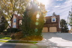 View of front of home featuring a garage