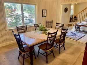 Dining area featuring a healthy amount of sunlight