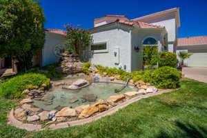 Mediterranean / spanish-style house featuring a garage