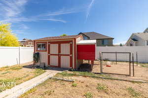 Fenced in chicken coop