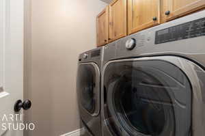 Laundry room with additional cabinetry - washer and dryer excluded.