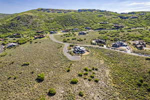 Birds eye view of property with a mountain view