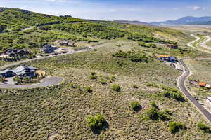 Birds eye view of property featuring a mountain view