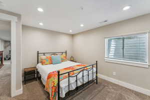 View of carpeted bedroom