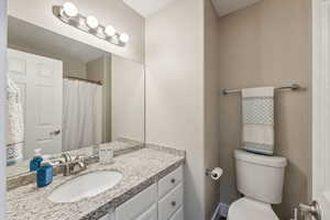 Bathroom featuring toilet and vanity