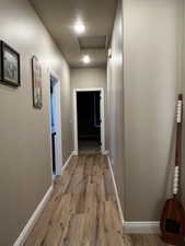 Hall featuring light hardwood / wood-style floors