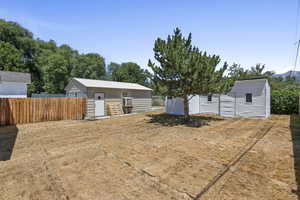 Exterior space featuring an outbuilding