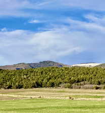 Property view of mountains featuring a rural view