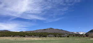 Property view of mountains featuring a rural view