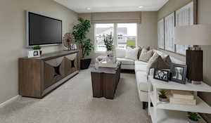 Living room with carpet.Materials and color features selected may vary; these are pictures of a model home.