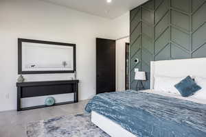 Bedroom featuring baseboards