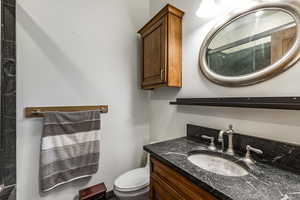 Bathroom featuring toilet and vanity