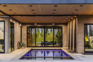 View of pool featuring a jacuzzi