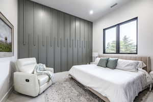 Bedroom featuring baseboards