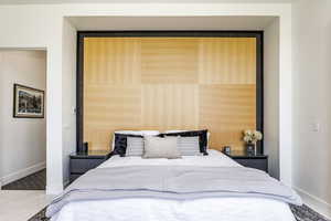 Bedroom featuring baseboards