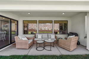 View of patio with an outdoor living space