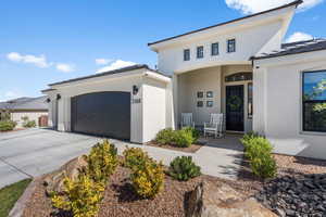 View of front of property featuring a garage