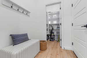 Living area with light hardwood / wood-style floors