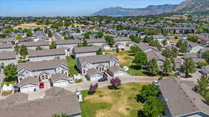 Birds eye view of property with a mountain view