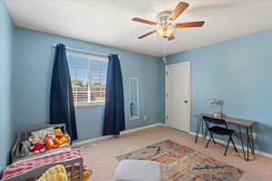 Interior space featuring ceiling fan