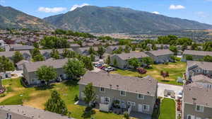 Birds eye view of property with a mountain view