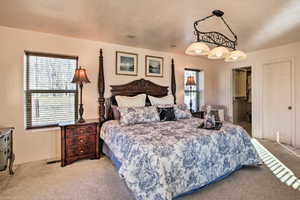 Master suite includes two custom walk-in closets