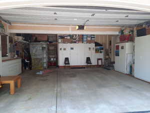 Large (710 sq,'), deep garage with abundant built-in storage.