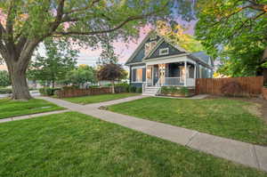 View of front of property featuring a lawn