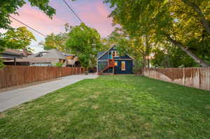 View of yard at dusk