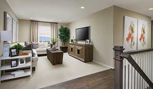 Living room with carpet has been selected for this home.A railing has NOT been selected for this home.Materials and colors may vary; this pictures is of a model home.