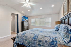 Bedroom featuring lofted ceiling, carpet, and ceiling fan