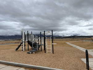 View of play area featuring a mountain view