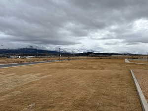 View of yard with a mountain view