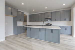 Kitchen with Greyhound Cabinets *Photo of like floorplan with similar finishes, options may vary*