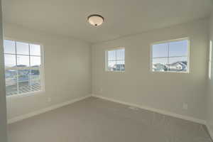 Secondary Upstairs Bedroom *Photo of like floorplan with similar finishes, options may vary*