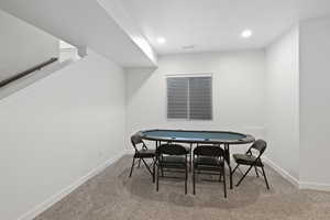 Dining room featuring carpet flooring