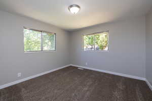 Empty room featuring carpet