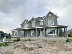 View of front of property with a porch