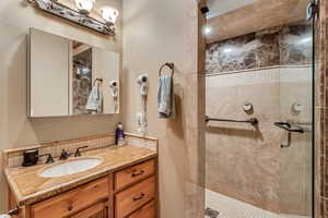 Hallway bathroom with steam shower