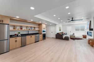 Bright and spacious downstairs family room and second kitchen.