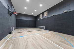 Sport court with 18' ceiling. Painted for pickle ball and basketball.