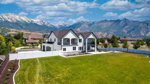 Gorgeous fully fenced yard with mountain view.