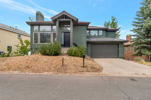 View of front of home with a garage