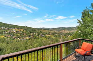 Wooden terrace with a mountain view