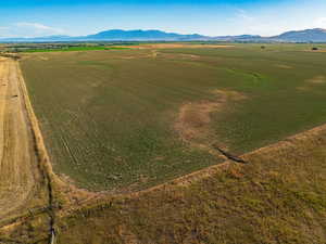 Drone / aerial view featuring a mountain view and a rural view