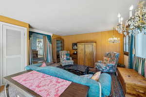 Bedroom with a chandelier