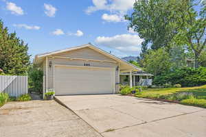 View of front of property with a garage