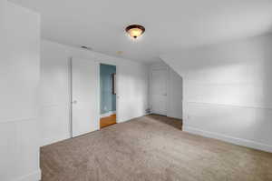 Unfurnished bedroom featuring carpet floors