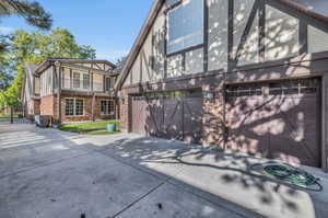 Back of house featuring a garage