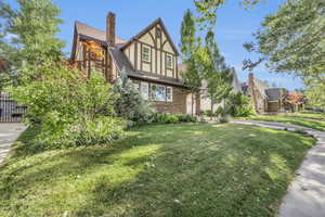 Tudor home featuring a front yard